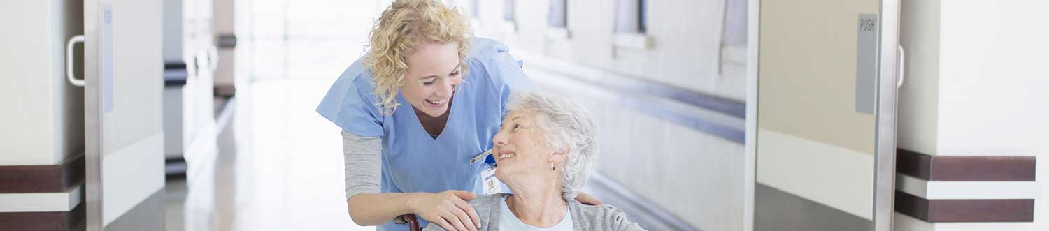 senior-banner-1-2268x500 nurse helping patient in wheelchair