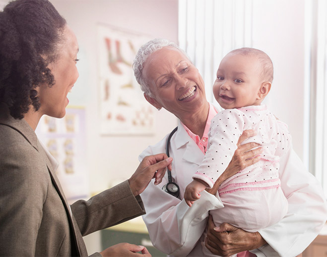 Mother, baby and doctor