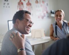 659x519-CA-Smiling-Senior-Man-with-Doctor-AA Senior Man with Doctor