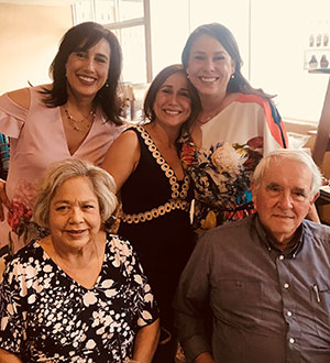 Monica Vargas-Mahar pictured with her parents and sisters