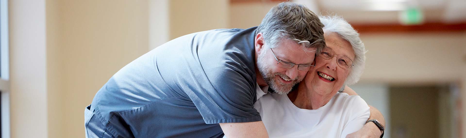 nurse hugging patient