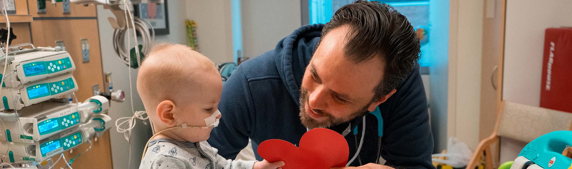 pediatrician comforting child